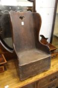 A 19th century oak childs lambing chair