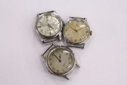 An Omega military wrist watch and two other Omega wrist watches (af)