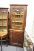 A 19th Century mahogany standing corner cabinet