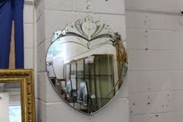 A Venetian style heart shaped wall mirror