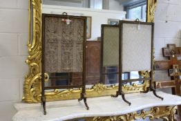Two good 19th century mahogany and brass mounted fire screens