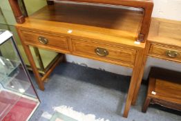 A Chinese two drawer side table