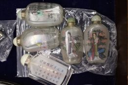 Five Chinese glass snuff bottles