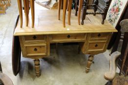 A19th century continental pine kneehole desk