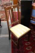 A set of five inlaid mahogany dining chairs