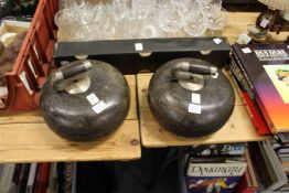Two old granite curling stones