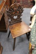 A Continental carved walnut hall chair