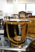 A pair of Art Deco style circular occasional tables