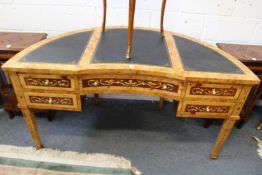 An impressive French style demi lune desk with leather inset top an arrangement of five drawers on