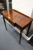 A mahogany single drawer side table