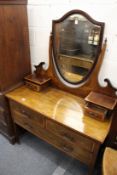 An Edwardian inlaid mahogany dressing chest