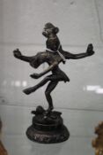 A small bronze four armed goddess or deity possibly 19th century