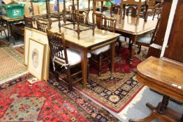 A large Persian style carpet, claret ground with floral decoration