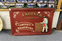 An old shop sign with wrought iron bracket