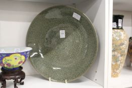 A Chinese crackle glazed celadon dish