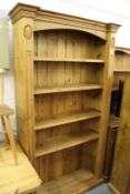 A pine standing open bookcase