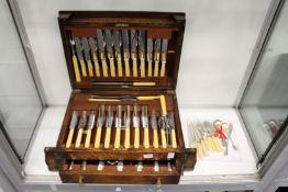 An oak cased canteen of cutlery and other flatware