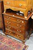 A small mahogany four drawer chest