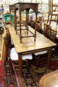 A good French 19th century oak farmhouse table with a pullout to one end