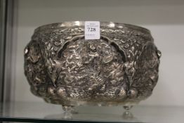 A good Burmese deity bowl, probably silver embossed and chased with figures and foliate design