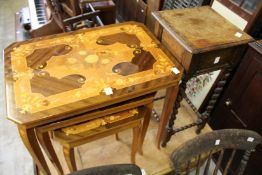 Nest of continental inlaid tables and a sewing table