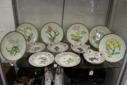 A set of six Meissen floral decorated small plates with pierced borders together with a pair of