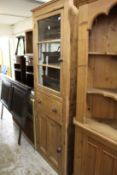 A tall pine standing cupboard