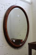 A modern oval mirror
