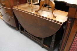 A 19th century oak gateleg dining table