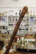 A Chinese carved bamboo walking stick