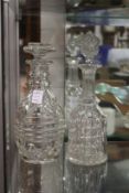 Two cut glass decanters