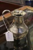 A Victorian engraved silver milk jug
