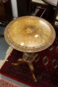 A Victorian inlaid walnut tripod table (lacking some inlay)