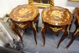 A pair of French style inlaid and ormolu mounted circular tables