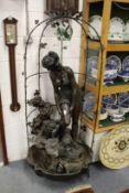 A large bronzed figural water feature