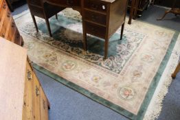 A Chinese green ground carpet