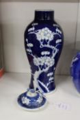 A 19/20th century Chinese blue and white prunus vase and cover