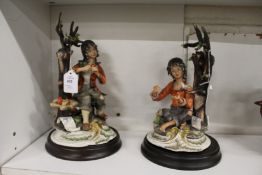 A pair of capet de monte figure groups