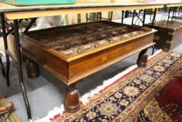 An unusual hardwood coffee table made from an old Eastern door
