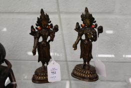 A pair of Eastern bronze deities inset with coral