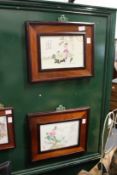 A pair of Chinese porcelain plaques in rosewood frames