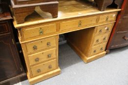 A Victorian gothic revival ash pedestal desk