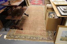 A Persian carpet (worn)