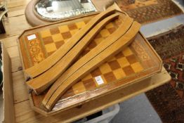 A games table including chess pieces etc