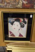 Colour photographic print of a Geisha girl in a decorative frame