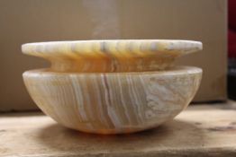A heavy alabaster bowl
