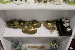 A group of decorative inkwells