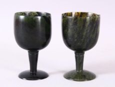 A GOOD PAIR OF MUGHAL CARVED SPINACH GREEN JADE GOBLETS, 10cm high X 5.6cm diameter