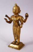 A 19TH / 20TH CENTURY INDIAN BRONZE FIGURE OF A DEITY, stood holding a vessel with plated hair, 20cm