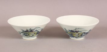 A PAIR OF 19TH / 20TH CENTURY CHINESE DOUCAI DECORATED PORCELAIN CUPS - decorated with ducks in